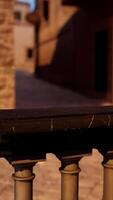 A close up of a railing with a building in the background video