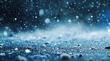 A blue sky with snow falling on the ground photo