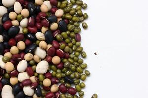 Top view of beans, black beans soybeans mung beans red beans with white beans mix photo