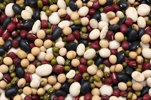 Top view of beans, black beans soybeans mung beans red beans with white beans mix photo