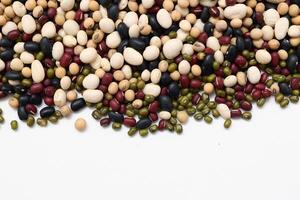 Top view of beans, black beans soybeans mung beans red beans with white beans mix photo