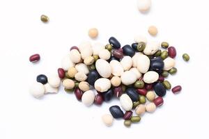 Top view of beans, black beans soybeans mung beans red beans with white beans mix photo