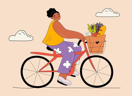 Happy black girl riding a bicycle