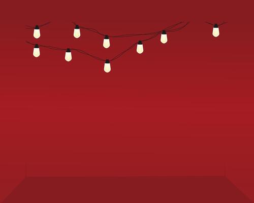 A red room with lights hanging from the ceiling