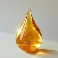 A drop of oil on a white surface photo
