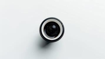 Directly above shot of a plain black coffee mug on a white background photo
