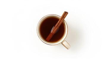 Cinnamon stick adds flavor to a cup of hot drink on a white background photo