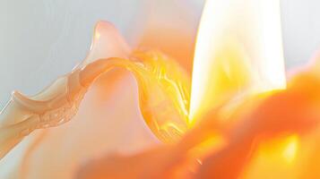 Close-up view of a burning candle creating a warm and romantic atmosphere with vibrant colors. photo