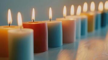 Line of vibrant candles glowing brightly, creating a cozy and welcoming atmosphere photo