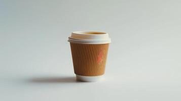 Disposable paper coffee cup casting a shadow on a white surface photo