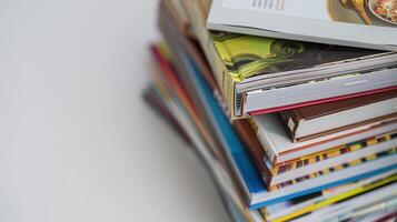 Books stacked on a white surface, symbolizing wisdom and education photo
