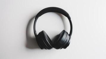 Sleek black wireless headphones with noise cancellation on white background photo