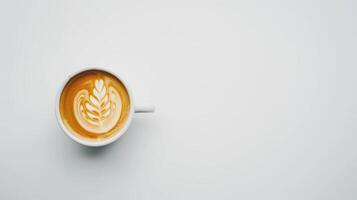 Cappuccino coffee with latte art on a white background, perfect for adding text or design elements photo