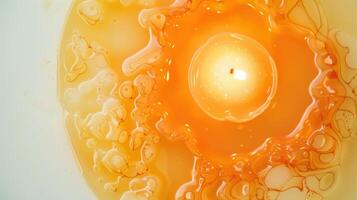 Aromatic round candle melting, creating abstract shapes with copy space, perfect for backgrounds photo