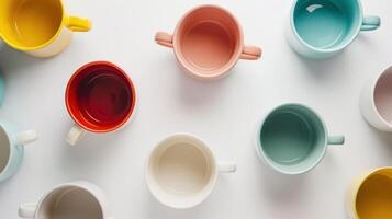 Overhead view of a vibrant array of empty coffee cups arranged in a pattern photo