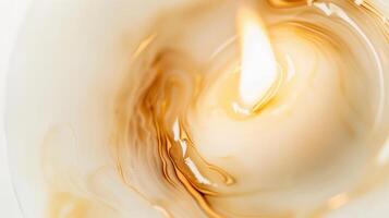 Captivating candle creates unique shapes with melted wax and warm glow photo