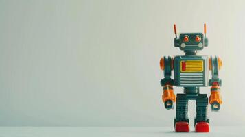 Antique toy robot proudly displayed on a white surface against a light blue background, photo