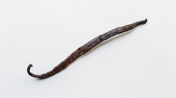 Single vanilla bean pod rests diagonally on a white surface. photo
