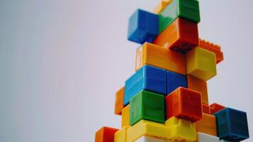 Colorful toy bricks forming an abstract structure, symbolizing growth and creativity photo