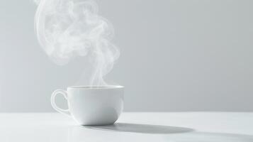 Steaming hot drink in a white cup on a neutral background photo