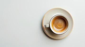 Freshly brewed cup of coffee is sitting on a white surface, offering a moment of relaxation photo