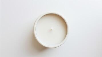 White scented candle is showcased against a clean and minimalist white background photo