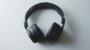 Stylish black wireless headphones with noise cancellation on a white backdrop photo