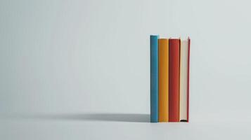Colorful stack of books on a white background, symbolizing the beauty of learning and knowledge photo