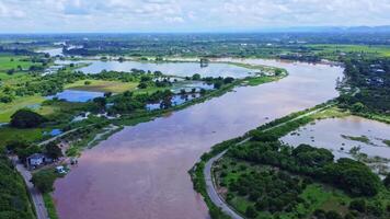 Drone aerial view of heavy flooding in local river after heavy rains. Climate change. video