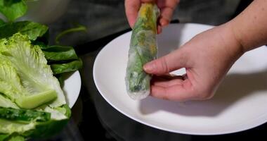 spring rolls Summer rolls with fresh vegetables and meat and peanut sauce. Vietnamese appetizer. Salad spring rolls with pork. Healthy food concept video