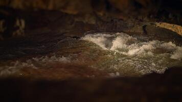 Exploring the Dynamic Water Flow in a Mysterious Cave Setting for Unique Experiences video