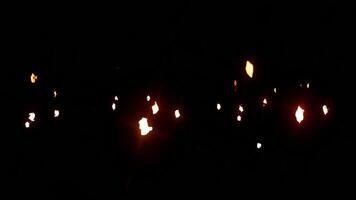 Animated background of fireballs glowing in the dark video