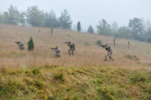 A disciplined and specialized military unit, donned in camouflage, strategically patrolling and maintaining control in a high-stakes environment, showcasing their precision, unity, and readiness for photo