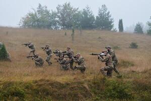 A disciplined and specialized military unit, donned in camouflage, strategically patrolling and maintaining control in a high-stakes environment, showcasing their precision, unity, and readiness for photo