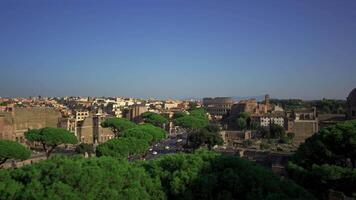 Overhead view of Rome city and coliseum from observation deck Atrio della liberta. Rome skyline and Colosseum from viewing point Piazza Venezia. Top view of Rome city with Colosseum and Roman Forum. video