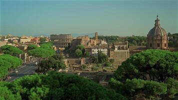 Overhead view of Rome city and coliseum from observation deck Atrio della liberta. Rome skyline and Colosseum from viewing point Piazza Venezia. Top view of Rome city with Colosseum and Roman Forum. video