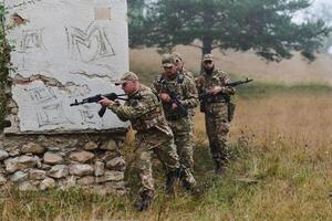 In a high stakes mission, a specialized military unit executes a tactical operation to secure a dangerous house where terrorists are believed to be hiding, showcasing precision and coordinated photo