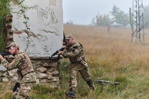 In a high stakes mission, a specialized military unit executes a tactical operation to secure a dangerous house where terrorists are believed to be hiding, showcasing precision and coordinated photo
