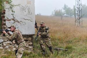 In a high stakes mission, a specialized military unit executes a tactical operation to secure a dangerous house where terrorists are believed to be hiding, showcasing precision and coordinated photo