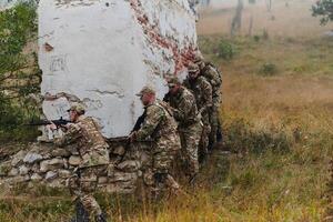 In a high stakes mission, a specialized military unit executes a tactical operation to secure a dangerous house where terrorists are believed to be hiding, showcasing precision and coordinated photo