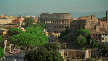 Overhead view of Rome city and coliseum from observation deck Atrio della liberta. Rome skyline and Colosseum from viewing point Piazza Venezia. Top view of Rome city with Colosseum and Roman Forum. video