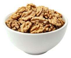 Freshly shelled walnuts in a white bowl on table png