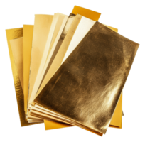 Variety of gold leaf sheets for crafting projects, cut out - stock . png