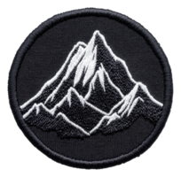 Embroidered mountain patch on a black background, cut out - stock . png