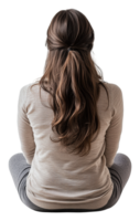 A woman sitting cross-legged in a serene setting, cut out - stock . png