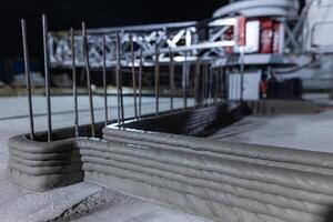 modern construction of 3D houses. printed house using a 3D printer photo