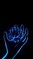 A hand holding a glowing object in the dark video