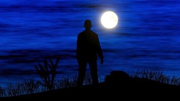 A man standing on a hill with a full moon in the background video