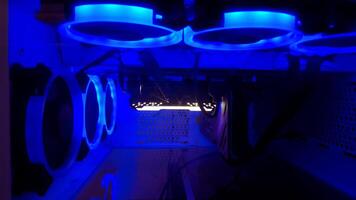 A computer case with blue lights on it photo