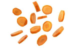 Carrot fresh fly float in Air turn to Cube dice and round slice shape photo